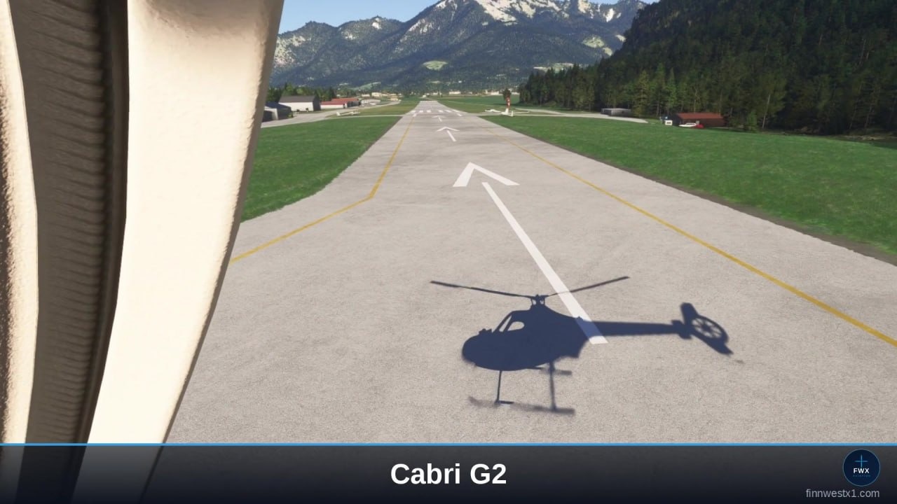 Blick aus dem Cockpit der Cabri G2 auf die Bahn: der Schatten der kleinen Maschine, Hauptrotor und Heckrotor getrennt erkennbar.